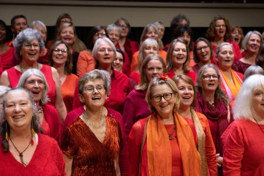 Smiling women singers in Gasworks Choir